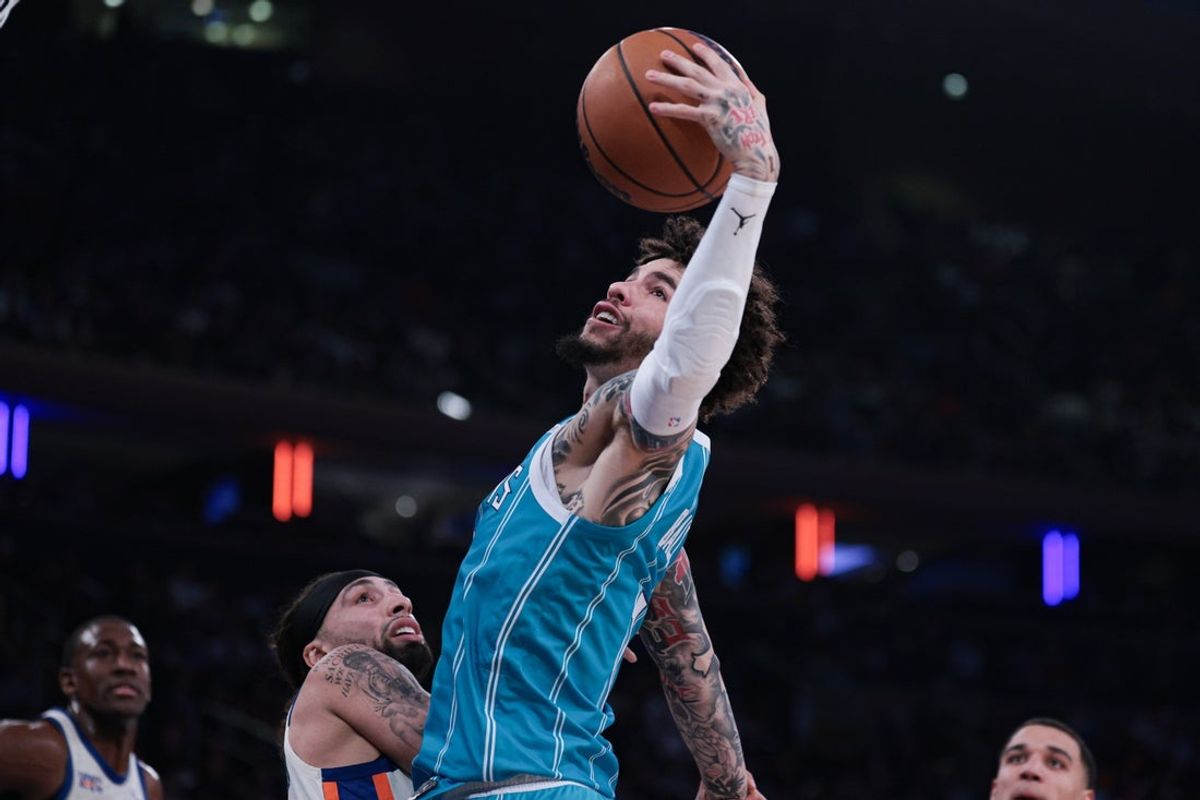 Apr 12, 2026; New York, New York, USA; Charlotte Hornets guard LaMelo Ball (1) rebounds during the first half against the New York Knicks at Madison Square Garden. Mandatory Credit: Vincent Carchietta-Imagn Images