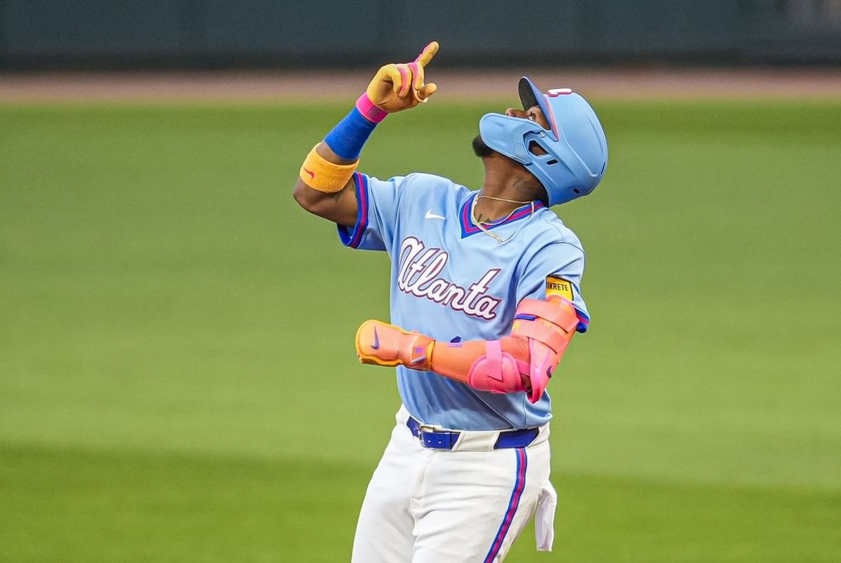 Apr 12, 2026; Cumberland, Georgia, USA; Atlanta Braves right fielder Ronald Acuña Jr. (13) reacts after hitting a single against the Cleveland Guardians during the first inning at Truist Park. Mandatory Credit: Dale Zanine-Imagn Images
