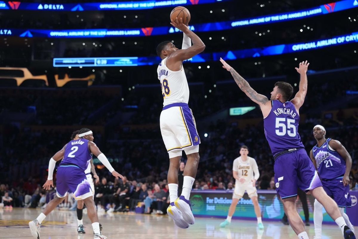 Apr 12, 2026; Los Angeles, California, USA; Los Angeles Lakers forward Rui Hachimura (28) shoots the ball against Utah Jazz guard John Konchar (55) in the first half at Crypto.com Arena. Mandatory Credit: Kirby Lee-Imagn Images