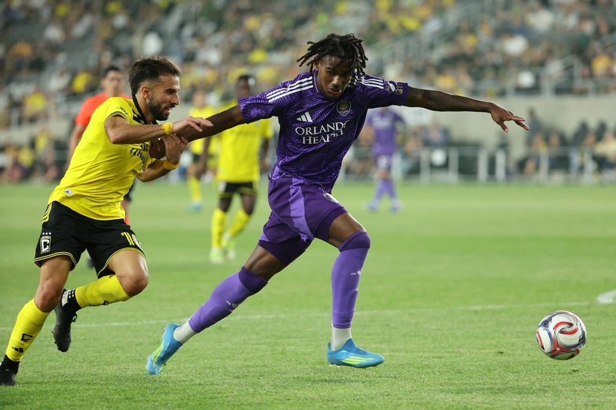 Apr 12, 2026; Columbus, Ohio, USA; Columbus Crew forward Diego Rossi (10) chases the ball against Orlando City SC defender Tahir Reid-Brown (29) during the second half at ScottsMiracle-Gro Field. Mandatory Credit: Joseph Maiorana-Imagn Images