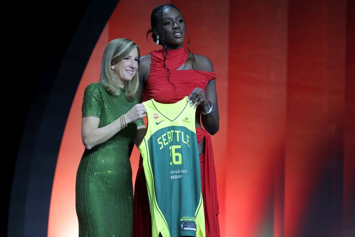 Apr 13, 2026; New York, NY, USA;  WNBA Commissioner Cathy Engelbert (left) poses for photos with Awa Fam Thiam who was selected third overall by the Seattle Storm during the 2026 WNBA Draft at The Shed at Hudson Yards. Mandatory Credit: Brad Penner-Imagn Images