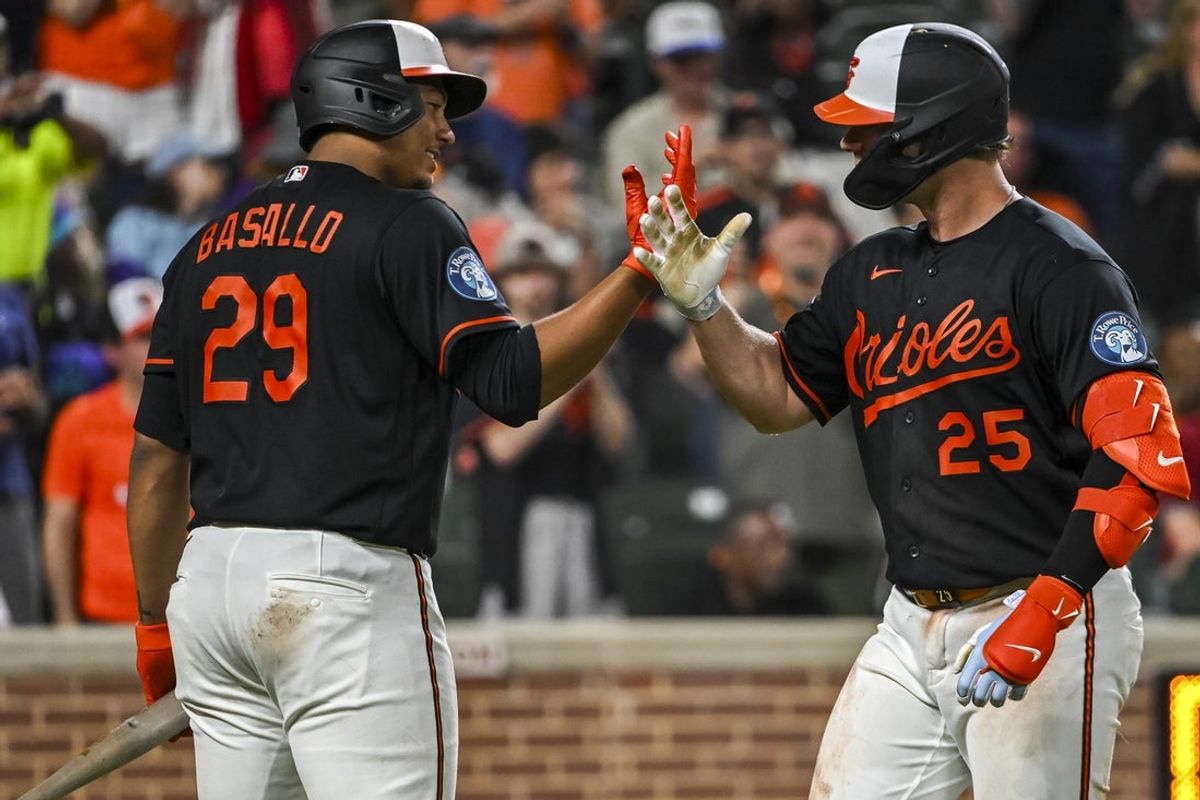 Apr 13, 2026; Baltimore, Maryland, USA; Baltimore Orioles first baseman Pete Alonso (25) celebrates with catcher Samuel Basallo (29) after scoring on his seventh inning home run against the Arizona Diamondbacks  at Oriole Park at Camden Yards. Mandatory Credit: Tommy Gilligan-Imagn Images