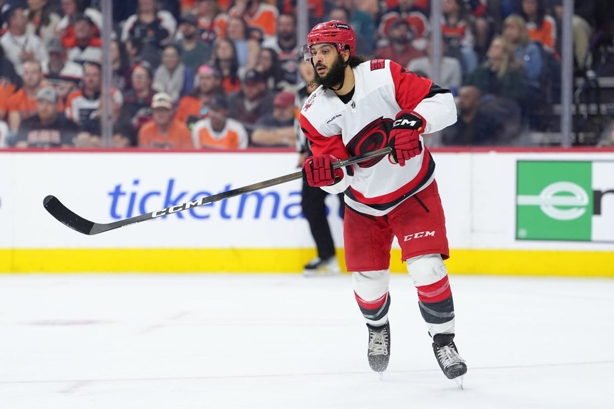 Apr 13, 2026; Philadelphia, Pennsylvania, USA; Carolina Hurricanes defenseman Jalen Chatfield (5) in action against the Philadelphia Flyers in the third period at Xfinity Mobile Arena. Mandatory Credit: Kyle Ross-Imagn Images