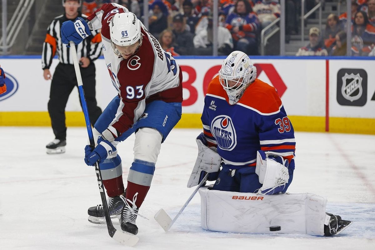 Apr 13, 2026; Edmonton, Alberta, CAN; Edmonton Oilers goaltender Connor Ingram (39) makes a save on a deflection by Colorado Avalanche forward Zakhar Bardakov (93) during the second period at Rogers Place. Mandatory Credit: Perry Nelson-Imagn Images