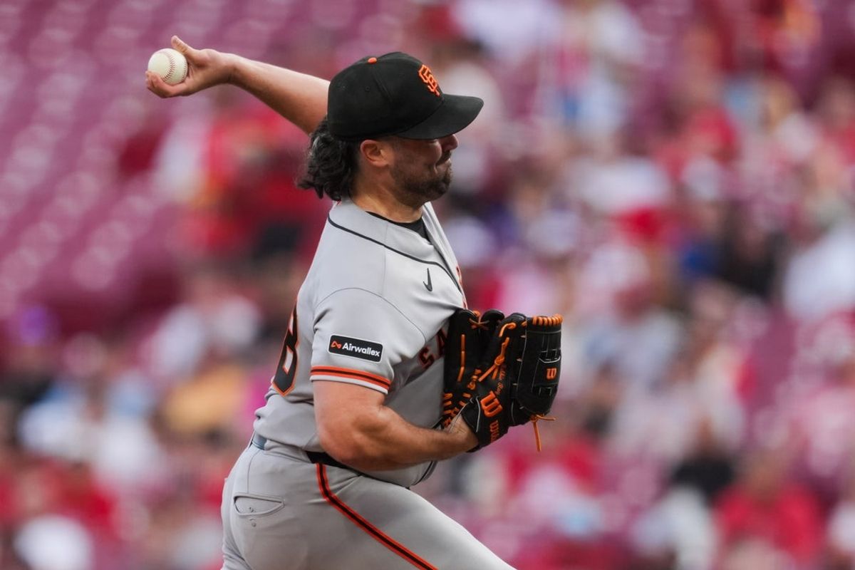 Apr 14, 2026; Cincinnati, Ohio, USA;  San Francisco Giants pitcher Robbie Ray (38) throws against the Cincinnati Reds in the first inning at Great American Ball Park. Mandatory Credit: Aaron Doster-Imagn Images