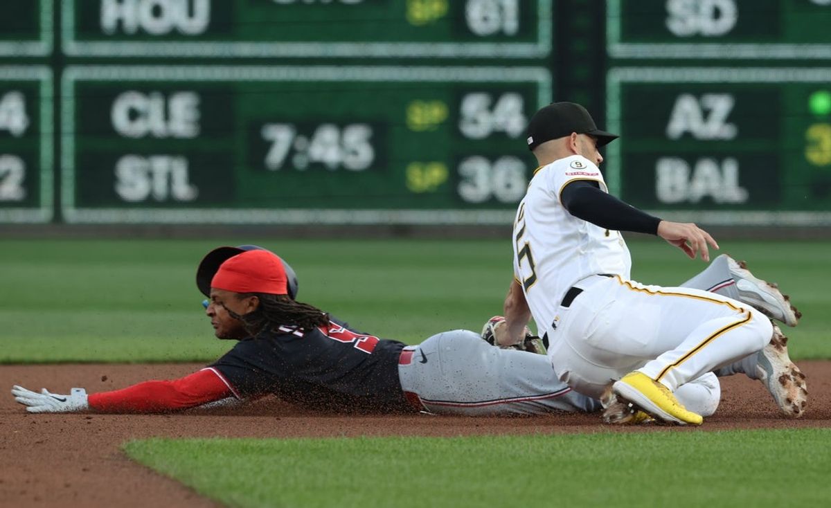 Apr 14, 2026; Pittsburgh, Pennsylvania, USA;  Pittsburgh Pirates second baseman Brandon Lowe (right) tags Washington Nationals shortstop CJ Abrams (5) out at second base on a steal attempt during the first inning at PNC Park. Mandatory Credit: Charles LeClaire-Imagn Images