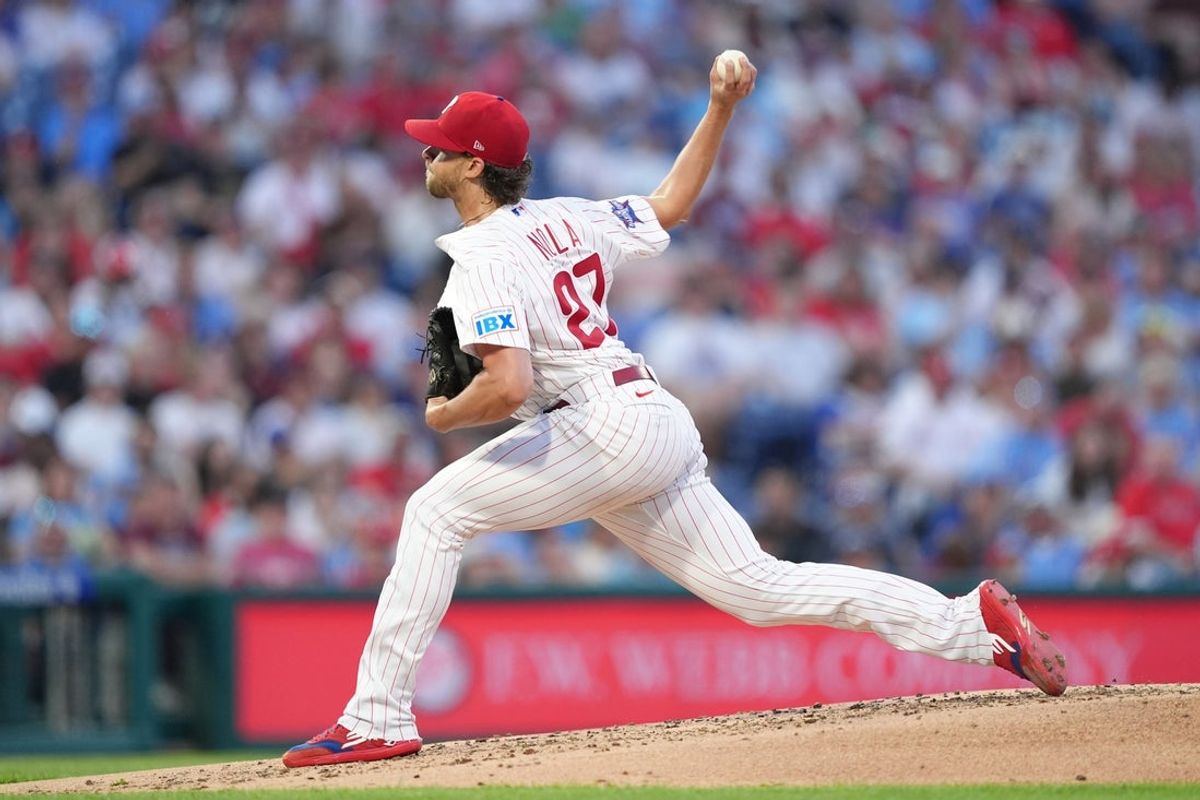 Apr 14, 2026; Philadelphia, Pennsylvania, USA; Philadelphia Phillies starting pitcher Aaron Nola (27) throws a pitch against the Chicago Cubs in the third inning at Citizens Bank Park. Mandatory Credit: Kyle Ross-Imagn Images