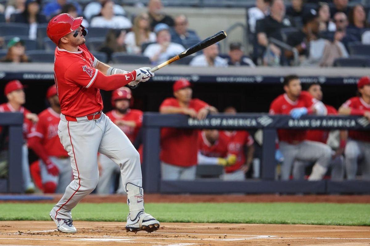 Apr 14, 2026; Bronx, New York, USA; Los Angeles Angels center fielder Mike Trout (27) hits a solo home run in the first inning against the Los Angeles Angels at Yankee Stadium. Mandatory Credit: Wendell Cruz-Imagn Images