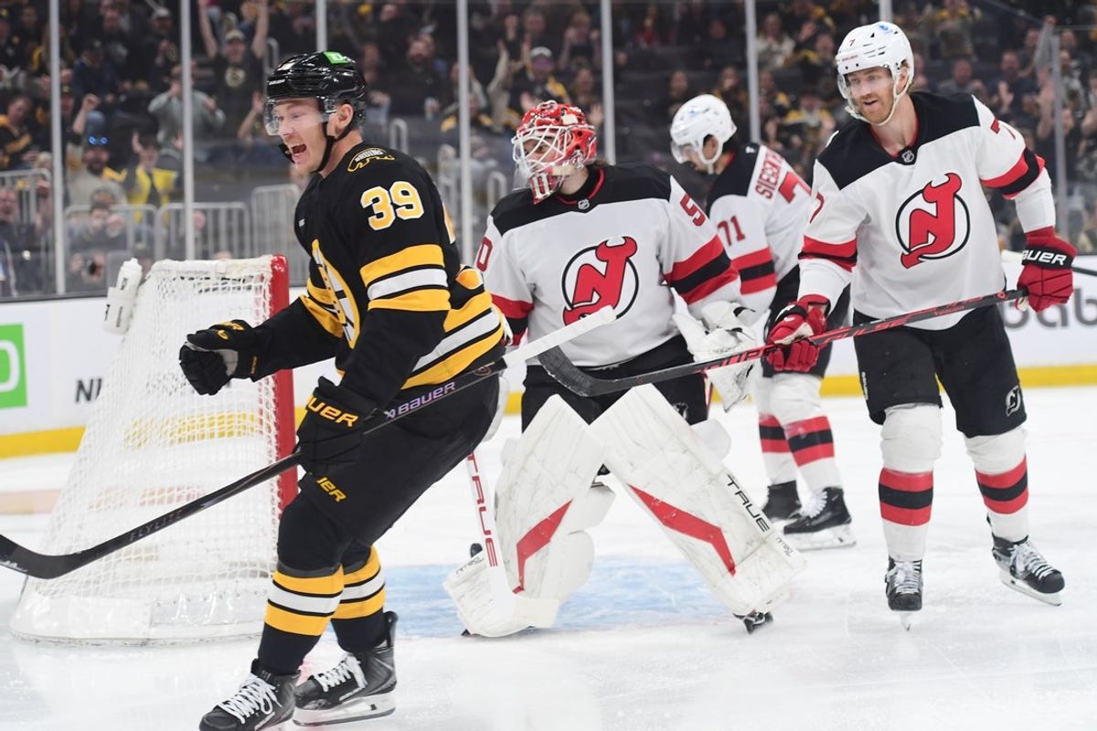 Apr 14, 2026; Boston, Massachusetts, USA; Boston Bruins center Morgan Geekie (39) reacts after scoring a goal past New Jersey Devils goalie Nico Daws (50) during the first period at TD Garden. Mandatory Credit: Bob DeChiara-Imagn Images