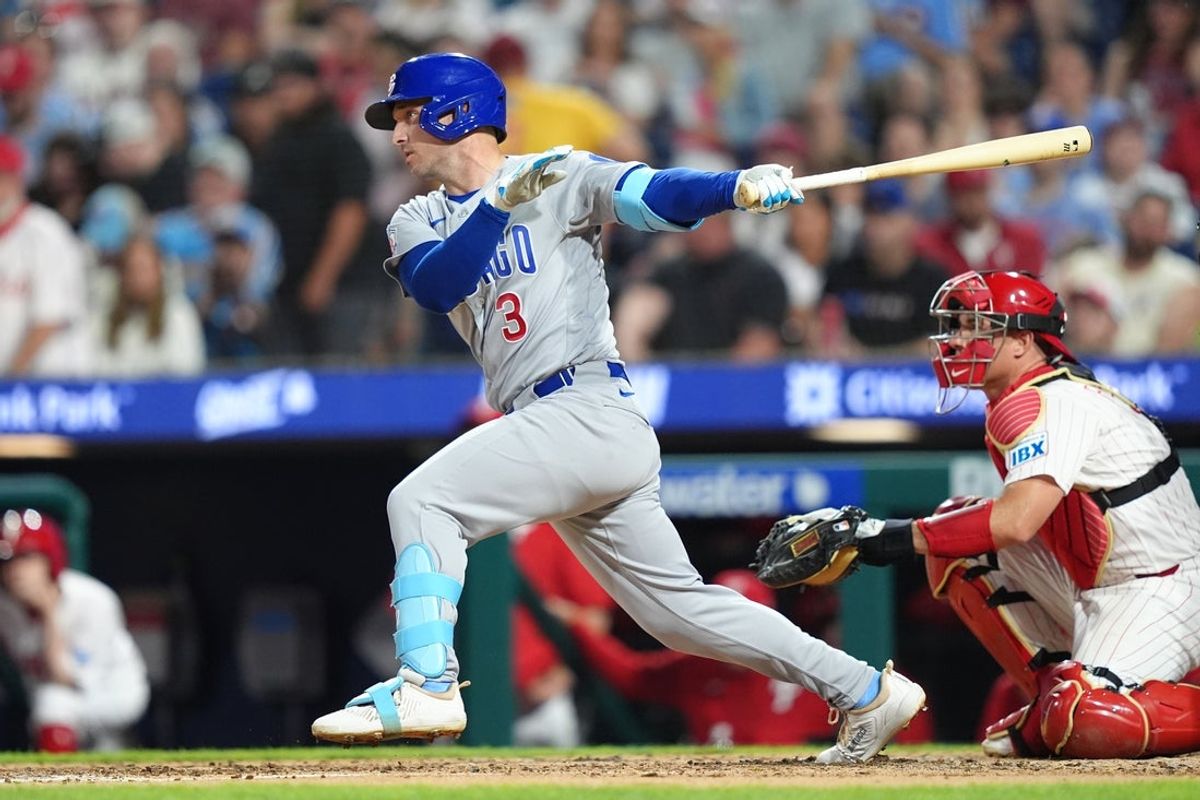 Apr 14, 2026; Philadelphia, Pennsylvania, USA; Chicago Cubs infielder Alex Bregman (3) hits an RBI single against the Philadelphia Phillies in the fifth inning at Citizens Bank Park. Mandatory Credit: Kyle Ross-Imagn Images