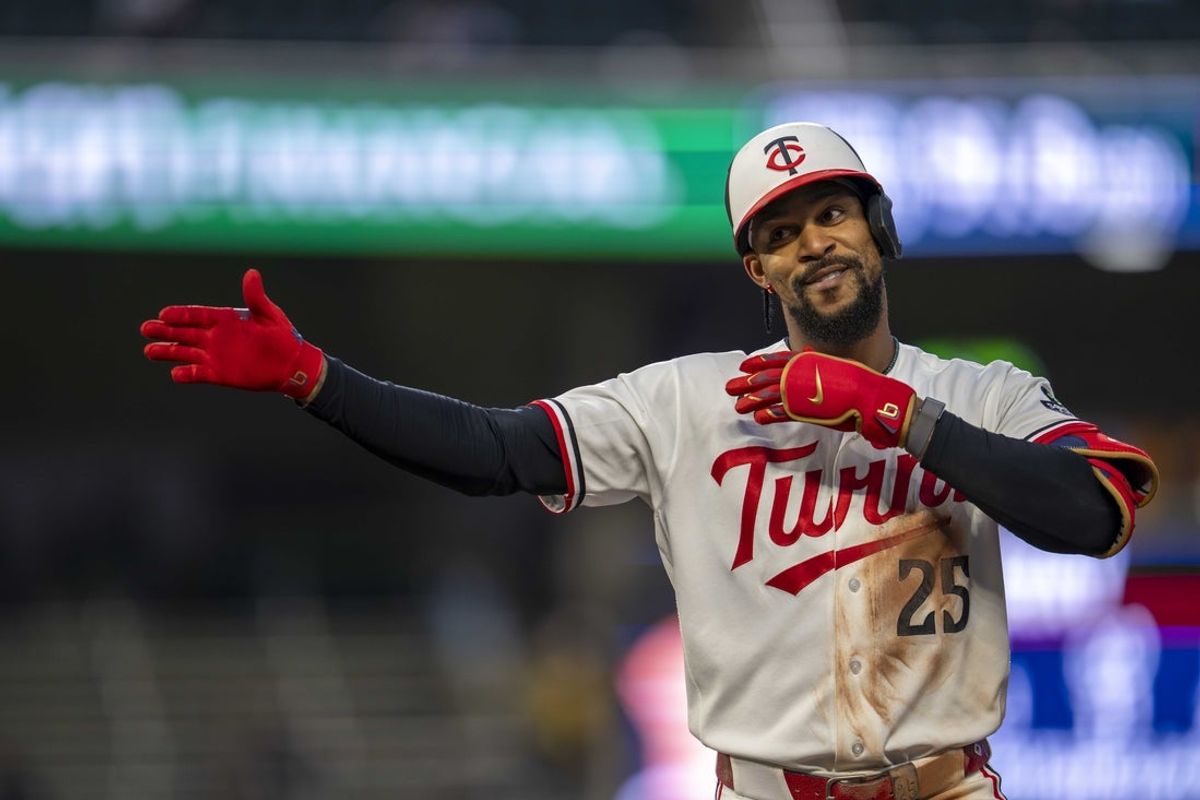 Apr 14, 2026; Minneapolis, Minnesota, USA; Minnesota Twins center fielder Byron Buxton (25) celebrates hitting a single against the Boston Red Sox in the fourth inning at Target Field. Mandatory Credit: Jesse Johnson-Imagn Images