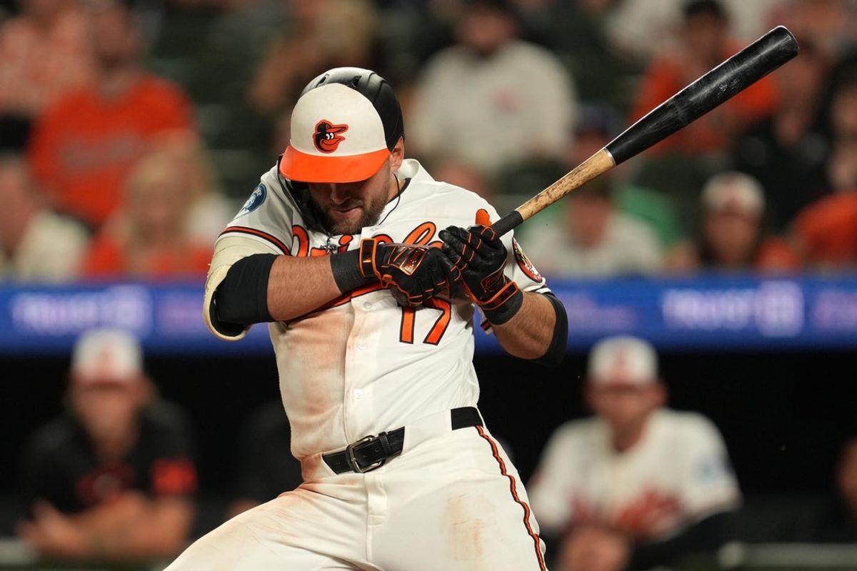 Apr 14, 2026; Baltimore, Maryland, USA; Baltimore Orioles outfielder Colton Cowser (17) reacts to an inside pitch during the eighth inning against the Arizona Diamondbacks at Oriole Park at Camden Yards. Mandatory Credit: Mitch Stringer-Imagn Images