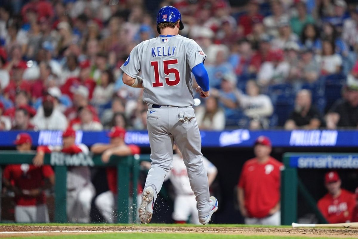 Apr 14, 2026; Philadelphia, Pennsylvania, USA; Chicago Cubs catcher Carson Kelly (15) advances home to score against the Philadelphia Phillies in the sixth inning at Citizens Bank Park. Mandatory Credit: Kyle Ross-Imagn Images