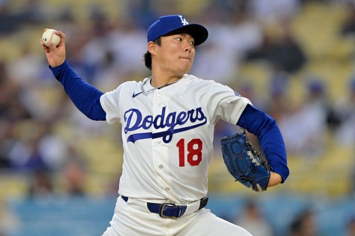 Apr 14, 2026; Los Angeles, California, USA; Los Angeles Dodgers pitcher Yoshinobu Yamamoto (18) throws a pitch against the New York Mets during the first inning at Dodger Stadium. Mandatory Credit: Jayne Kamin-Oncea-Imagn Images