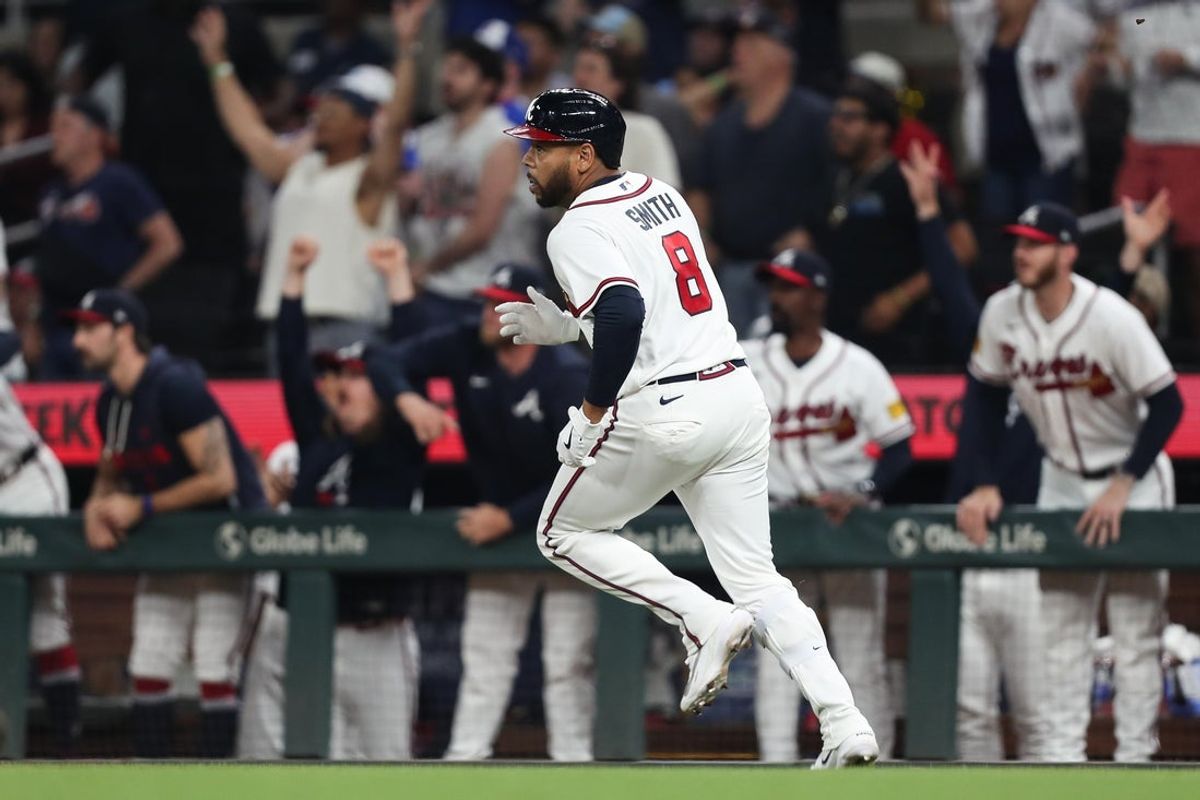Apr 14, 2026; Cumberland, Georgia, USA; Atlanta Braves designated hitter Dominic Smith (8) runs the bases after hitting a three-run double against the Miami Marlins in the eight inning at Truist Park. Mandatory Credit: Mady Mertens-Imagn Images