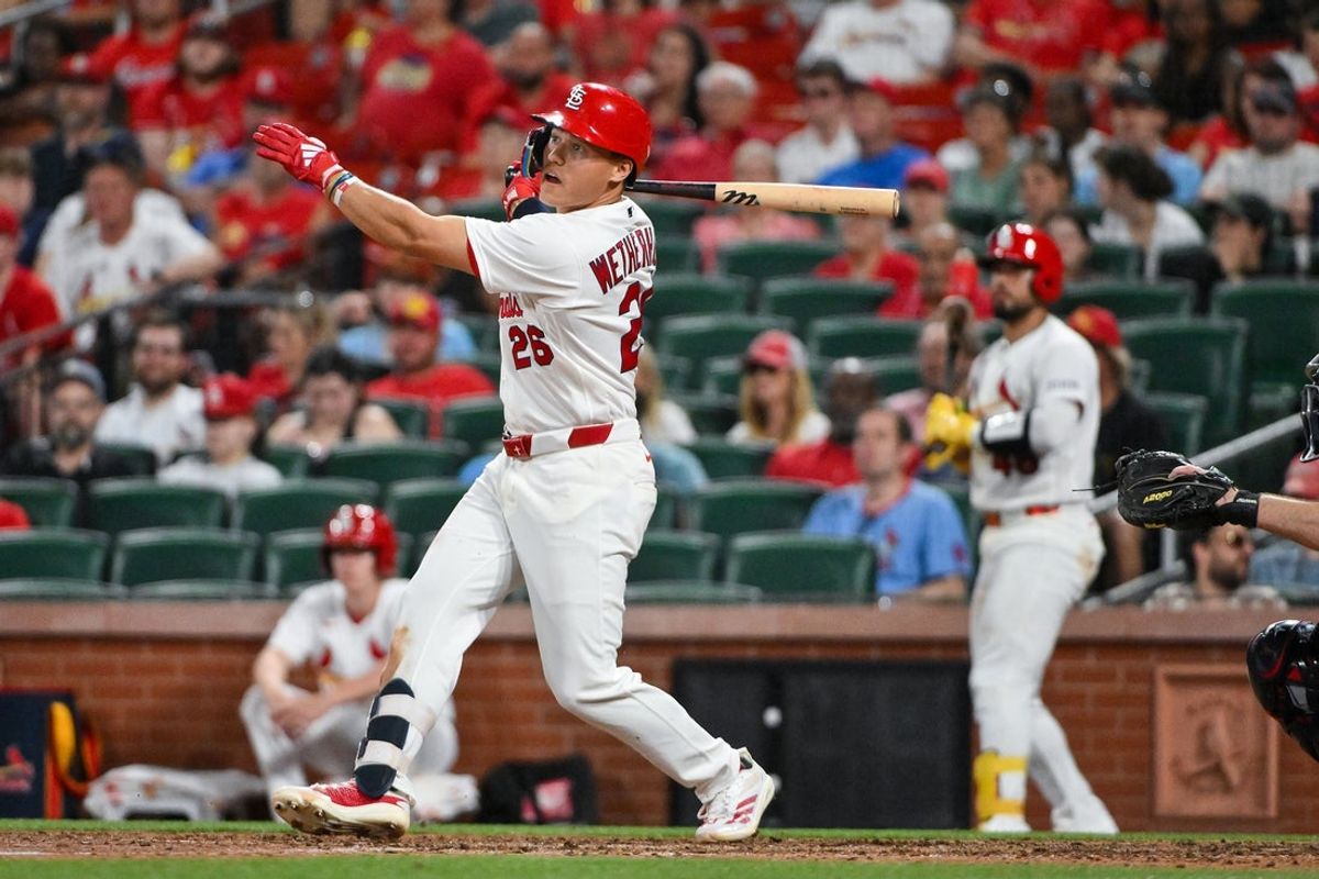 Apr 14, 2026; St. Louis, Missouri, USA; St. Louis Cardinals second baseman JJ Wetherholt (26) hits a two run home run for his second home run of the game against the Cleveland Guardians during the eighth inning at Busch Stadium. Mandatory Credit: Jeff Curry-Imagn Images