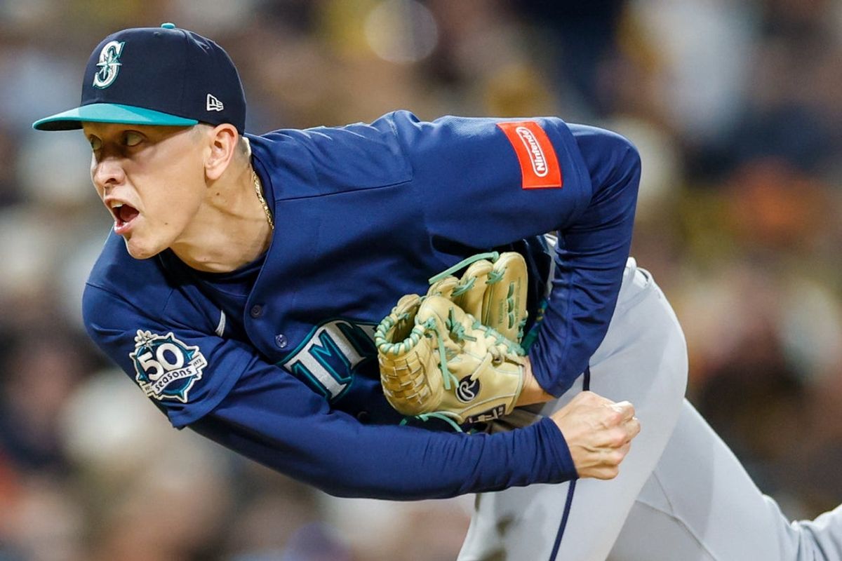 Apr 14, 2026; San Diego, California, USA; Seattle Mariners relief pitcher Casey Legumina (64) throws a pitch during the eighth inning against the San Diego Padres at Petco Park. Mandatory Credit: David Frerker-Imagn Images