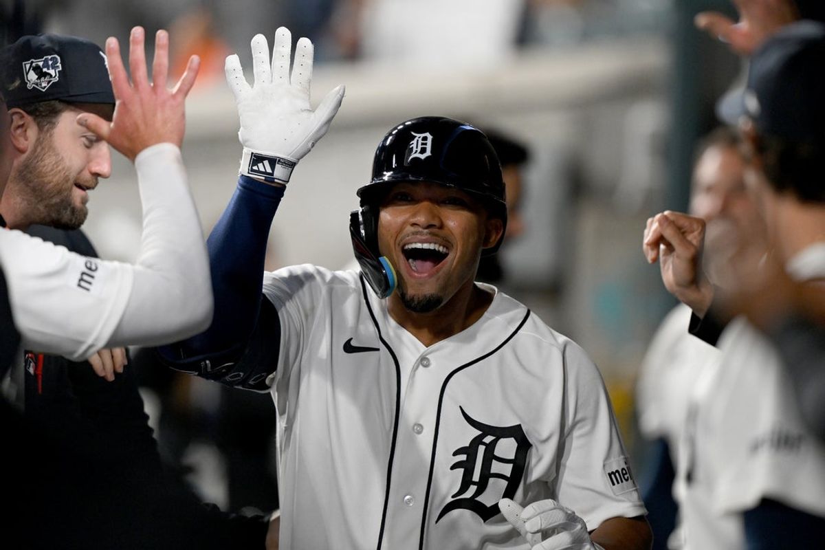 Apr 15, 2026; Detroit, Michigan, USA;  Detroit Tigers center fielder Wenceel Perez celebrates in the dugout after hitting a solo home run against the City Royals in the eighth inning at Comerica Park. Mandatory Credit: Lon Horwedel-Imagn Images
