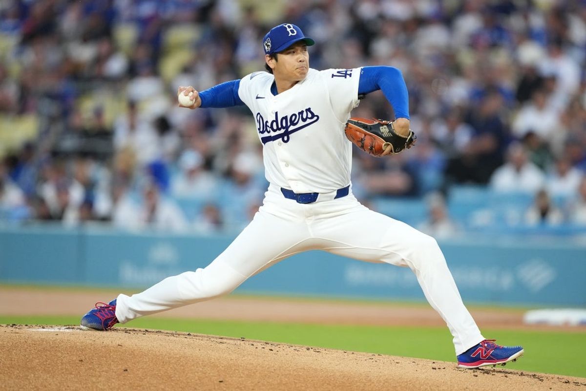 Apr 15, 2026; Los Angeles, California, USA; Los Angeles Dodgers two-way player Shohei Ohtani pitches against the New York Mets in the first inning at Dodger Stadium. Mandatory Credit: Kirby Lee-Imagn Images