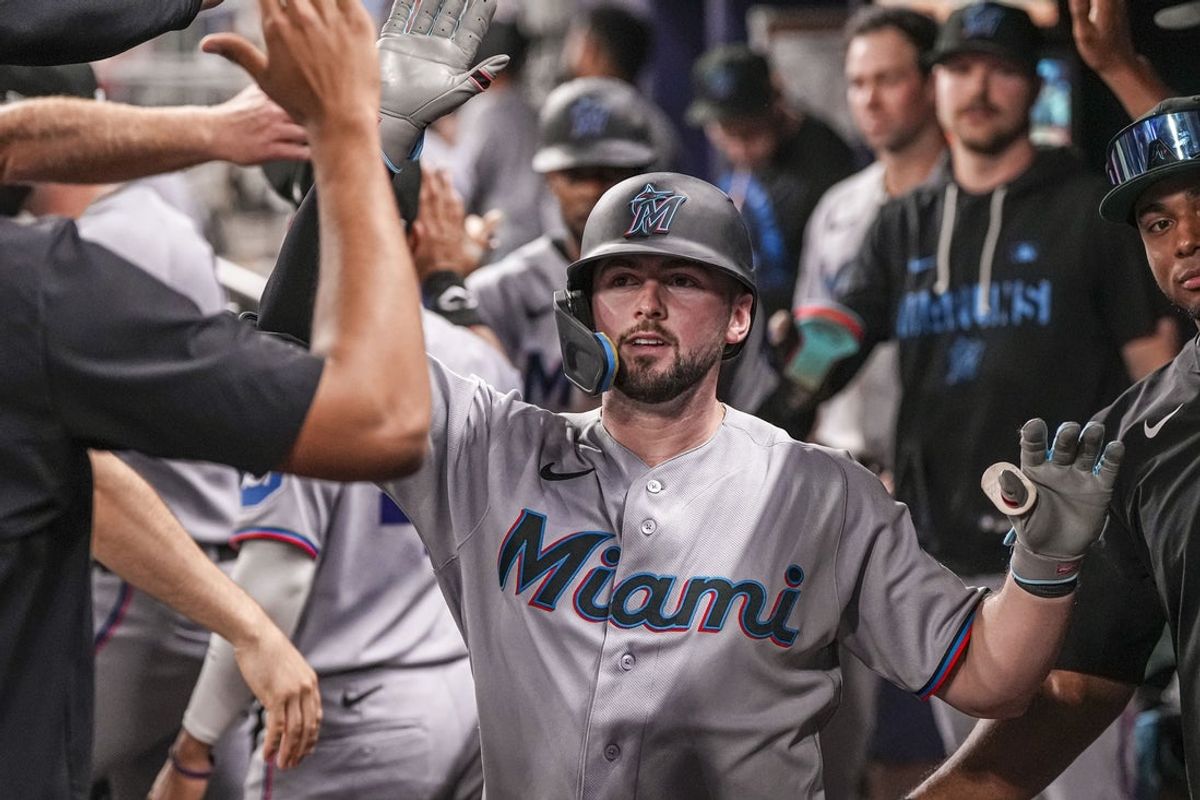 Apr 15, 2026; Cumberland, Georgia, USA; Miami Marlins catcher Liam Hicks (34) runs and reacts after hitting a two run home run against the Atlanta Braves during the eighth inning at Truist Park. All players are wearing number 42 today in honor of Jackie Robinson. Mandatory Credit: Dale Zanine-Imagn Images