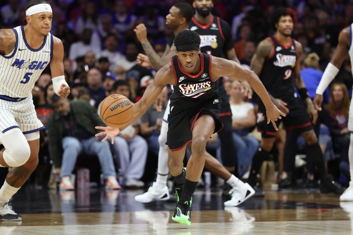 Apr 15, 2026; Philadelphia, Pennsylvania, USA; Philadelphia 76ers guard Vj Edgecombe (77) controls the ball against the Orlando Magic during the third quarter of a play-in round of the 2026 NBA Playoffs at Xfinity Mobile Arena. Mandatory Credit: Bill Streicher-Imagn Images