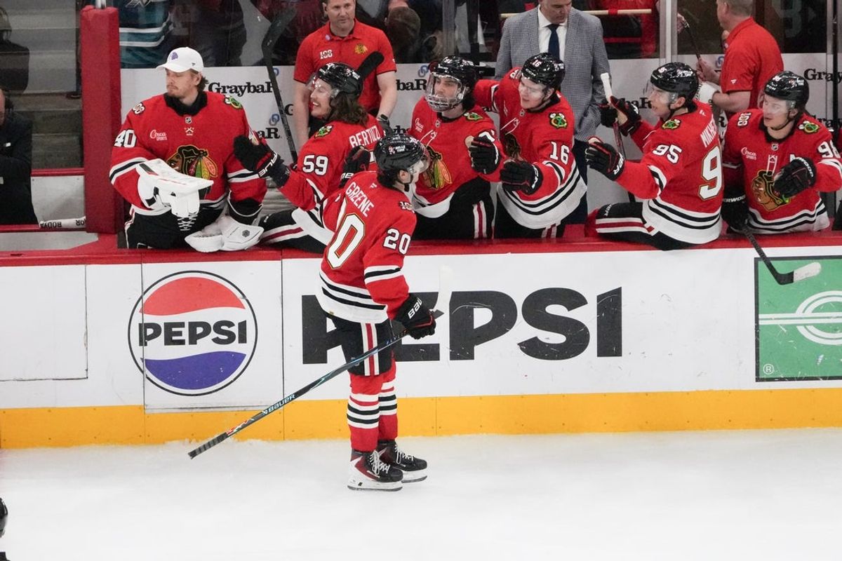 Apr 15, 2026; Chicago, Illinois, USA; Chicago Blackhawks center Ryan Greene (20) celebrates his goal against the San Jose Sharks during the third period at United Center. Mandatory Credit: David Banks-Imagn Images