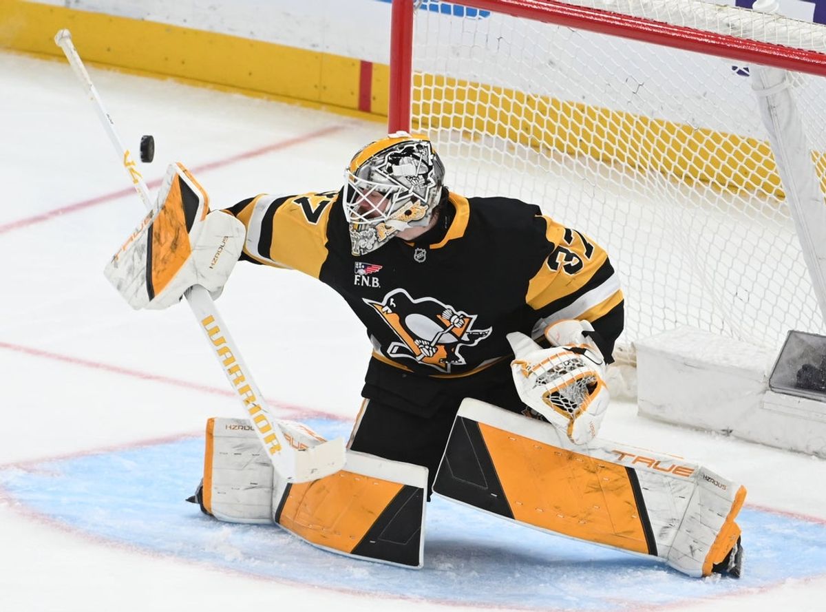Apr 11, 2026; Pittsburgh, Pennsylvania, USA; Pittsburgh Penguins goalie Arturs Silovs (37) redirects the puck against the Washington Capitals during the second period  at PPG Paints Arena. Mandatory Credit: Philip G. Pavely-Imagn Images
