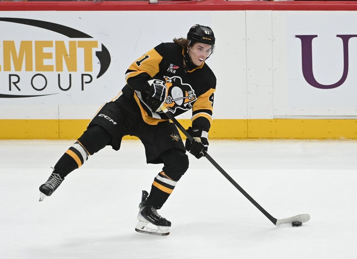 Apr 11, 2026; Pittsburgh, Pennsylvania, USA; Pittsburgh Penguins right wing Ville Koivunen (41) passes the puck against the Washington Capitals during the third period at PPG Paints Arena. Mandatory Credit: Philip G. Pavely-Imagn Images