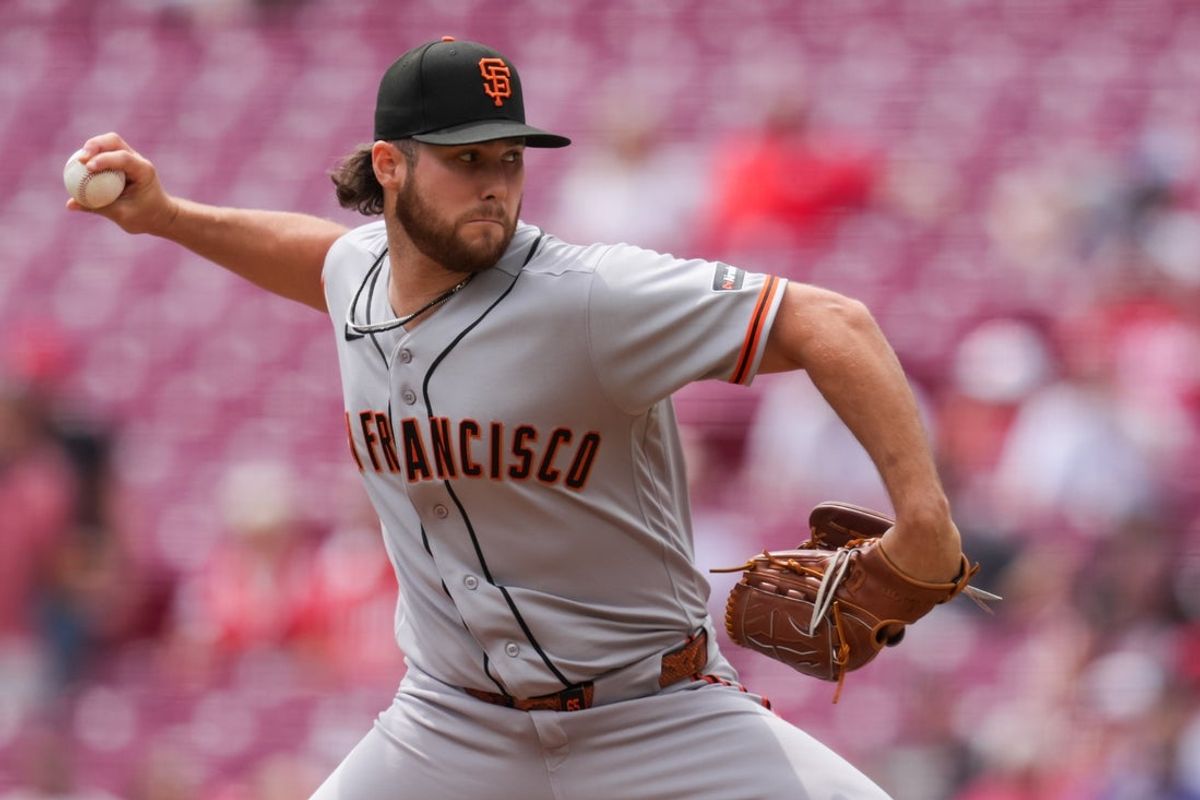 Apr 16, 2026; Cincinnati, Ohio, USA; San Francisco Giants pitcher Landen Roupp (65) throws against the Cincinnati Reds in the first inning at Great American Ball Park. Mandatory Credit: Aaron Doster-Imagn Images