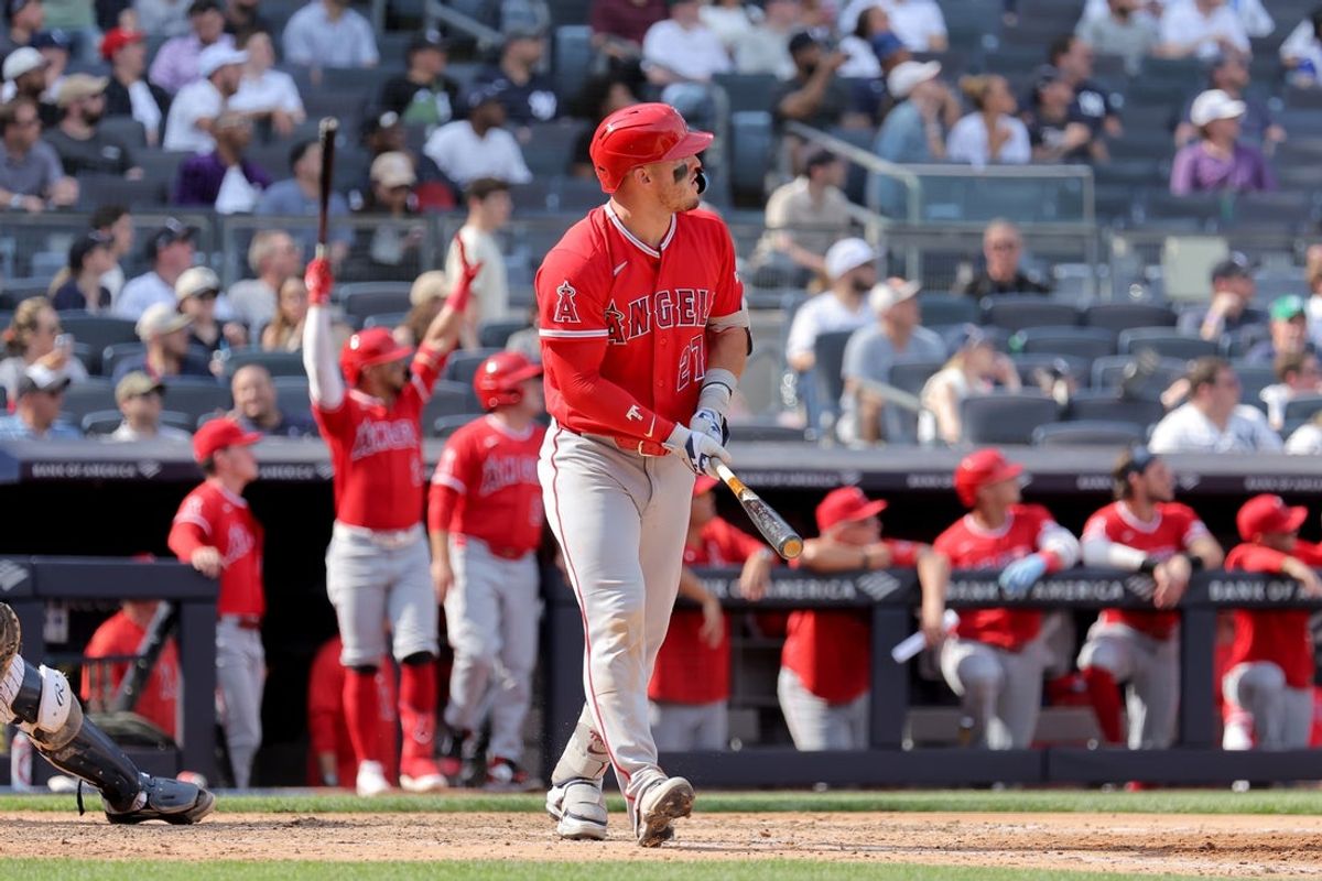 Apr 16, 2026; Bronx, New York, USA; Los Angeles Angels designated hitter Mike Trout (27) watches his solo home run against the New York Yankees during the seventh inning at Yankee Stadium. Mandatory Credit: Brad Penner-Imagn Images