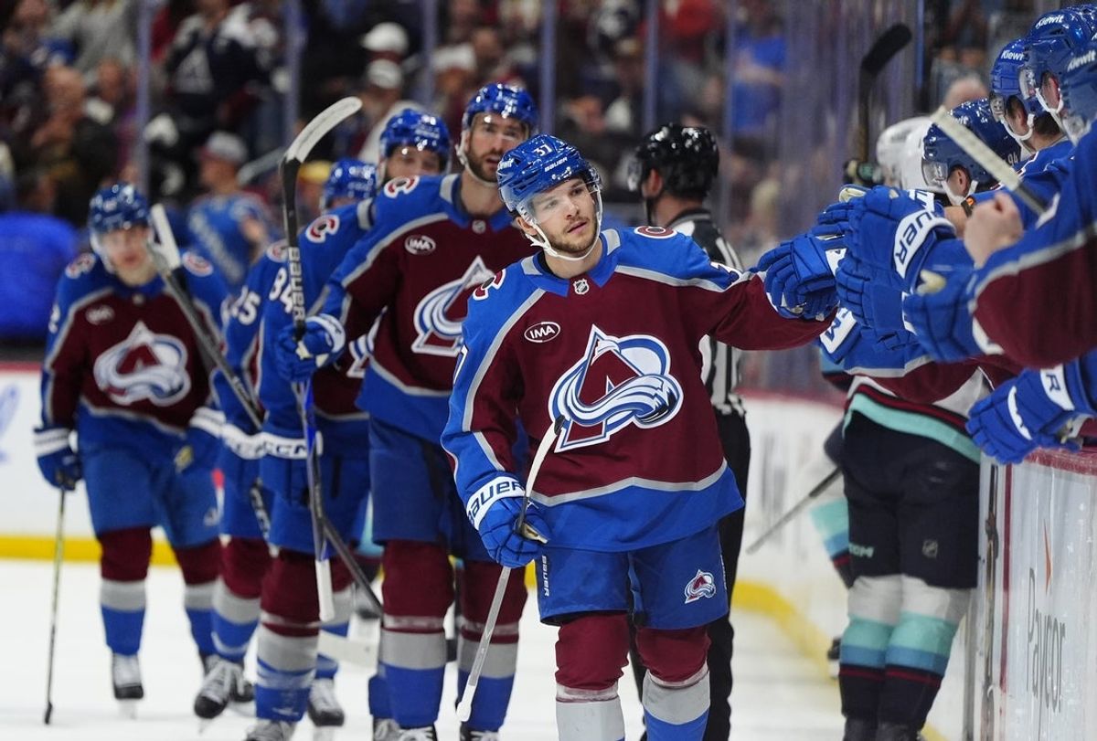 Apr 16, 2026; Denver, Colorado, USA; Colorado Avalanche defenseman Nick Blankenburg (37) celebrates his goal in the first period against the Seattle Kraken at Ball Arena. Mandatory Credit: Ron Chenoy-Imagn Images