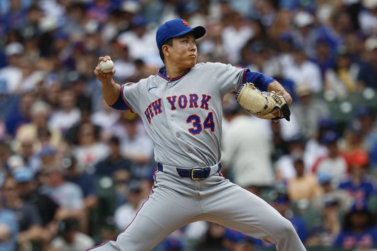 Apr 17, 2026; Chicago, Illinois, USA; New York Mets starting pitcher Kodai Senga (34) delivers a pitch against the Chicago Cubs during the first inning at Wrigley Field. Mandatory Credit: Kamil Krzaczynski-Imagn Images
