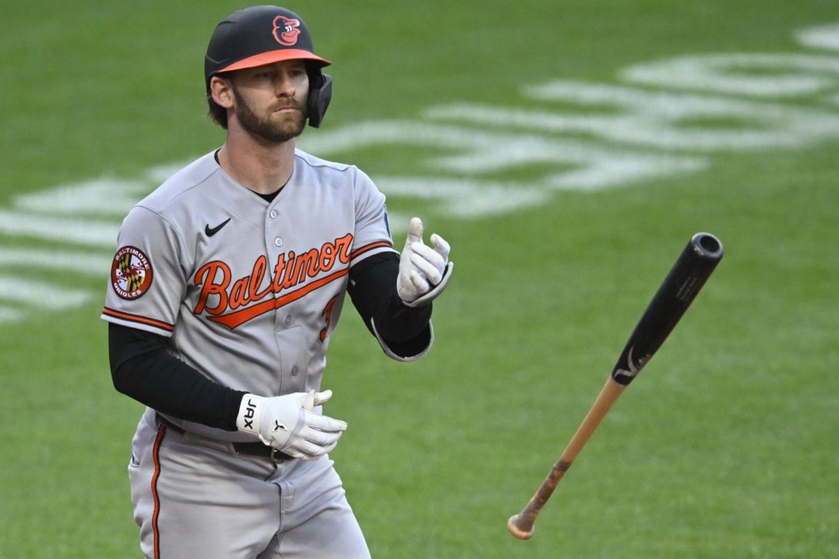 Apr 17, 2026; Cleveland, Ohio, USA; Baltimore Orioles left fielder Taylor Ward (3) tosses his bat after walking in the third inning against the Cleveland Guardians at Progressive Field. Mandatory Credit: David Richard-Imagn Images