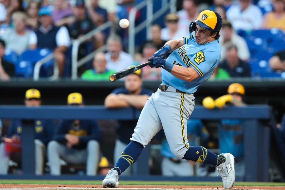 Apr 17, 2026; Miami, Florida, USA; Milwaukee Brewers right fielder Sal Frelick (10) hits a single against the Miami Marlins during the first inning at loanDepot Park. Mandatory Credit: Sam Navarro-Imagn Images