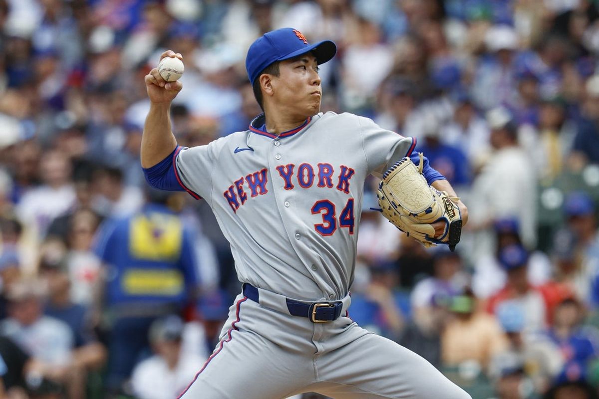 Apr 17, 2026; Chicago, Illinois, USA; New York Mets starting pitcher Kodai Senga (34) delivers a pitch against the Chicago Cubs during the first inning at Wrigley Field. Mandatory Credit: Kamil Krzaczynski-Imagn Images
