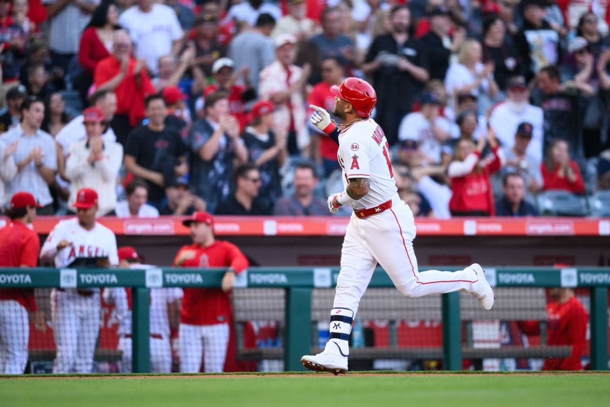 Apr 17, 2026; Anaheim, California, USA; Los Angeles Angels third baseman Yoán Moncada (10) gestures after hitting a home run during the second inning against the San Diego Padres at Angel Stadium. Mandatory Credit: William Liang-Imagn Images