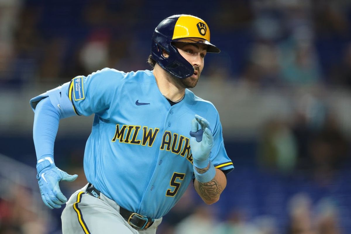 Apr 17, 2026; Miami, Florida, USA; Milwaukee Brewers center fielder Garrett Mitchell (5) runs toward second base after hitting a two-run double against the Miami Marlins during the tenth inning at loanDepot Park. Mandatory Credit: Sam Navarro-Imagn Images
