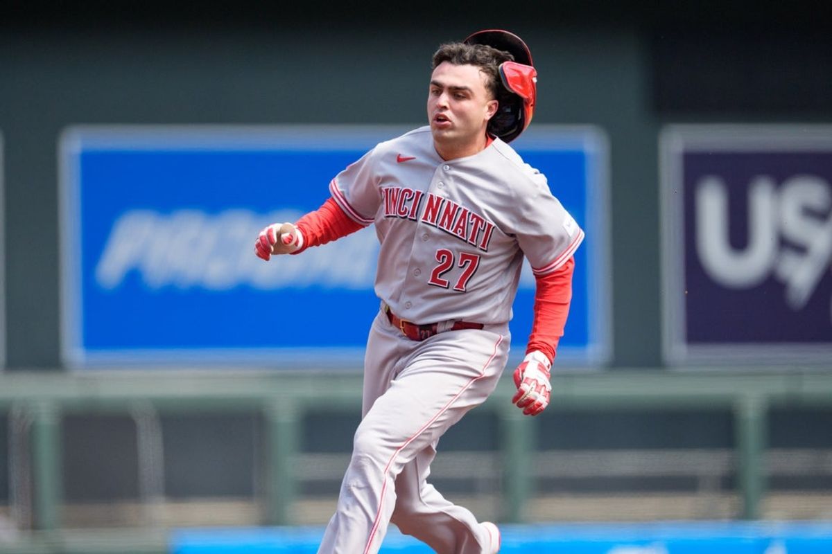 Apr 18, 2026; Minneapolis, Minnesota, USA; Cincinnati Reds second baseman Sal Stewart (27) loses his helmet as he runs to third base against the Minnesota Twins in the second inning at Target Field. Mandatory Credit: Matt Blewett-Imagn Images