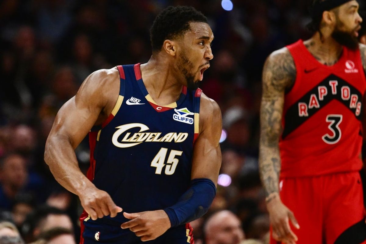 Apr 18, 2026; Cleveland, Ohio, USA; Cleveland Cavaliers guard Donovan Mitchell (45) celebrates after hitting a three point basket against the Toronto Raptors during the second half of game one in the first round of the 2026 NBA Playoffs at Rocket Arena. Mandatory Credit: Ken Blaze-Imagn Images