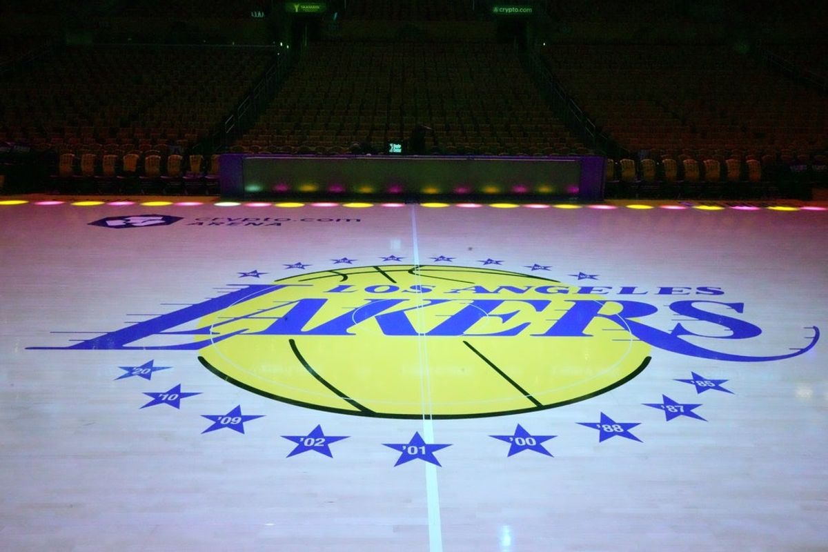 Apr 18, 2026; Los Angeles, California, USA; The Los Angeles Lakers logo at midcourt during game one of the first round of the 2026 NBA Playoffs against the Houston Rockets at Crypto.com Arena. Mandatory Credit: Kirby Lee-Imagn Images