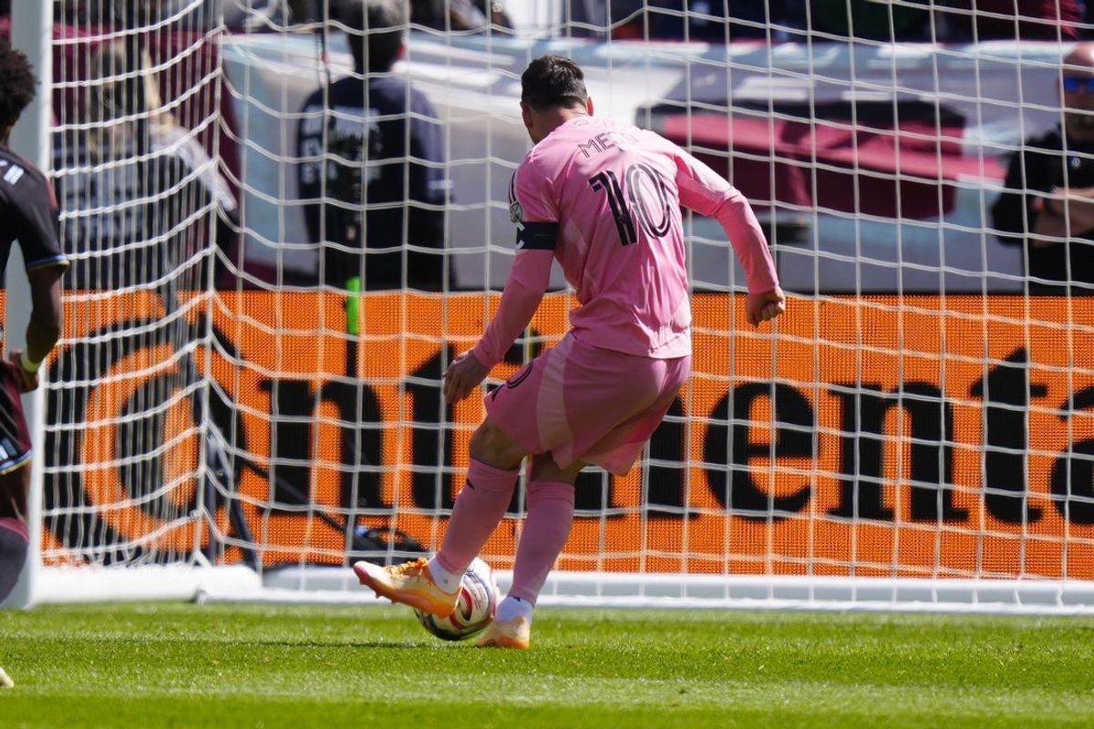 Apr 18, 2026; Denver, Colorado, USA; Inter Miami CF forward Lionel Messi (10) kicks and scores a penalty kick in the first half against the Colorado Rapids at Empower Field at Mile High. Mandatory Credit: Ron Chenoy-Imagn Images