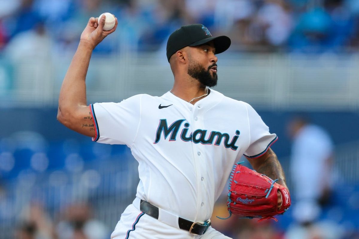 Apr 18, 2026; Miami, Florida, USA; Miami Marlins starting pitcher Sandy Alcantara (22) delivers a pitch against the Milwaukee Brewers during the fourth inning at loanDepot Park. Mandatory Credit: Sam Navarro-Imagn Images