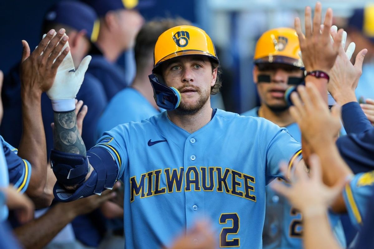Apr 18, 2026; Miami, Florida, USA; Milwaukee Brewers second baseman Brice Turang (2) celebrates with teammates after hitting a two-run home against the Miami Marlins during the fifth inning at loanDepot Park. Mandatory Credit: Sam Navarro-Imagn Images
