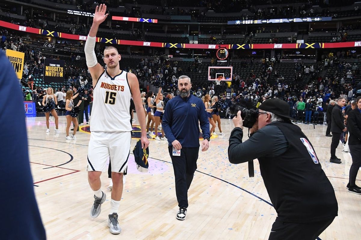 Apr 18, 2026; Denver, Colorado, USA; Denver Nuggets center Nikola Jokic (15) walks off the court after a win against the Minnesota Timberwolves in game one of the first round of the 2026 NBA Playoffs at Ball Arena. Mandatory Credit: Christopher Hanewinckel-Imagn Images