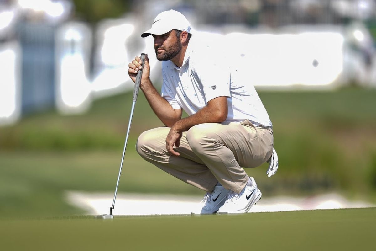 Apr 18, 2026; Hilton Head, South Carolina, USA; Scottie Scheffler eyes his line on 17 during the third round of the RBC Heritage golf tournament. Mandatory Credit: Jim Dedmon-Imagn Images