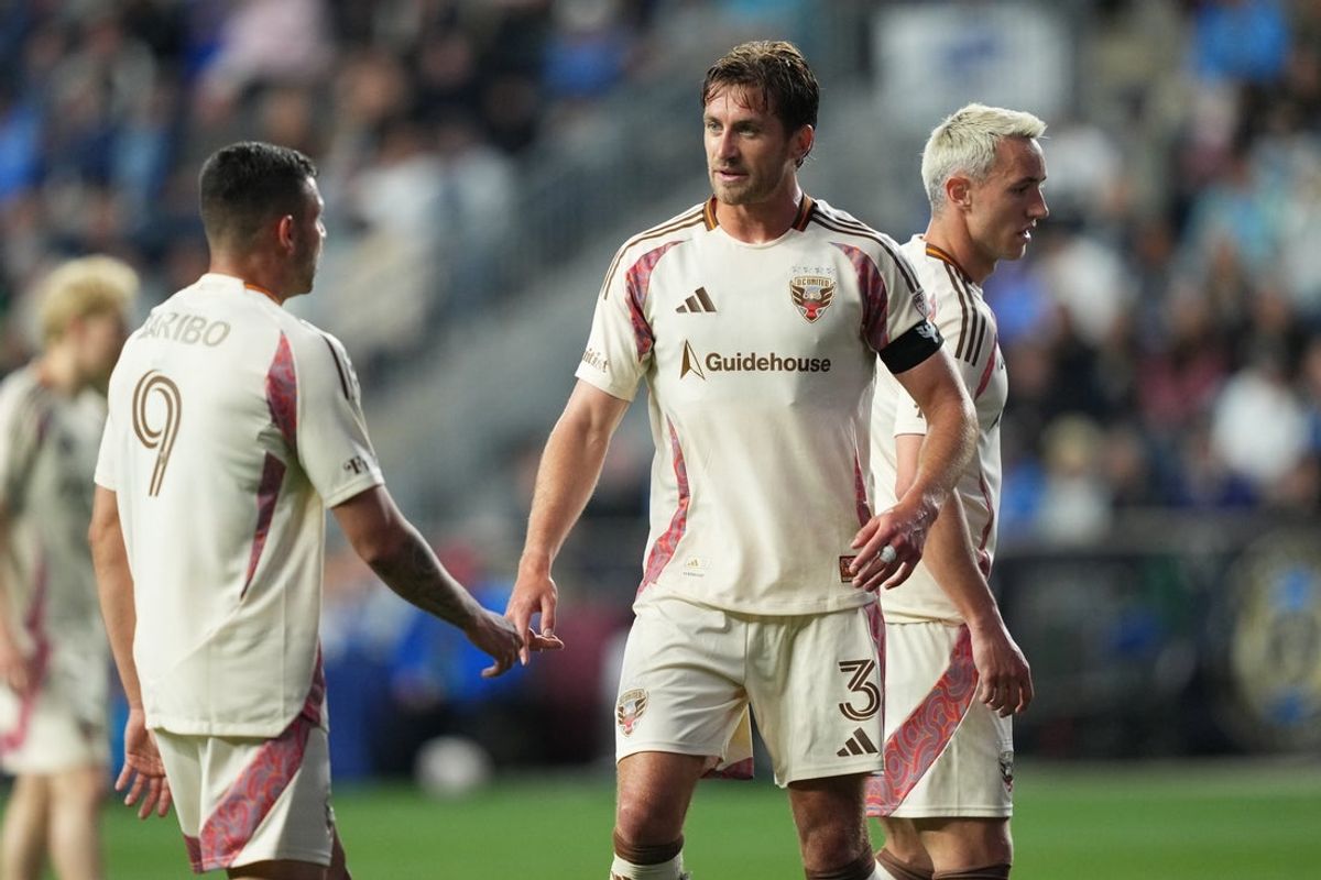 Apr 18, 2026; Chester, Pennsylvania, USA; DC United defender Lucas Bartlett (3) reacts with forward Tai Baribo (9) against the Philadelphia Union in the first half at Subaru Park. Mandatory Credit: Kyle Ross-Imagn Images