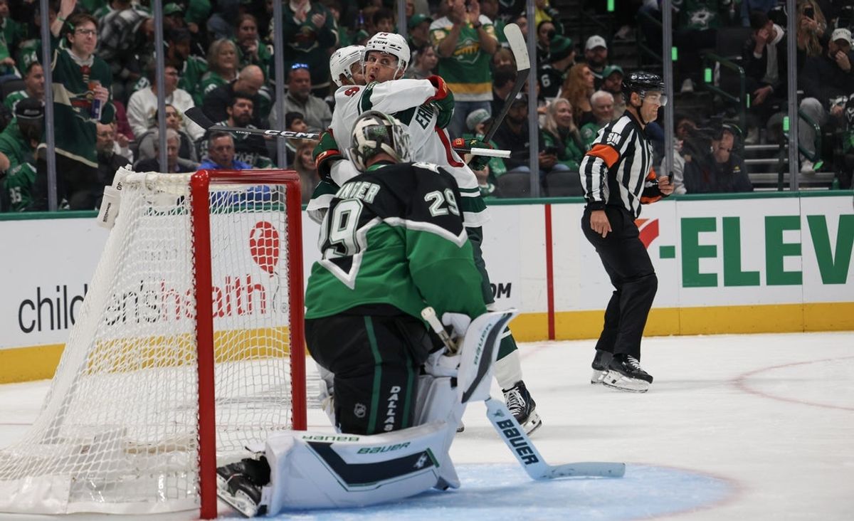 Apr 18, 2026; Dallas, Texas, USA; Minnesota Wild left wing Kirill Kaprizov (97) celebrates center Joel Eriksson Ek (14) goal against Dallas Stars goaltender Jake Oettinger (29) in the third period in game one of the first round of the 2026 Stanley Cup Playoffs at American Airlines Center. Mandatory Credit: Thomas Shea-Imagn Images