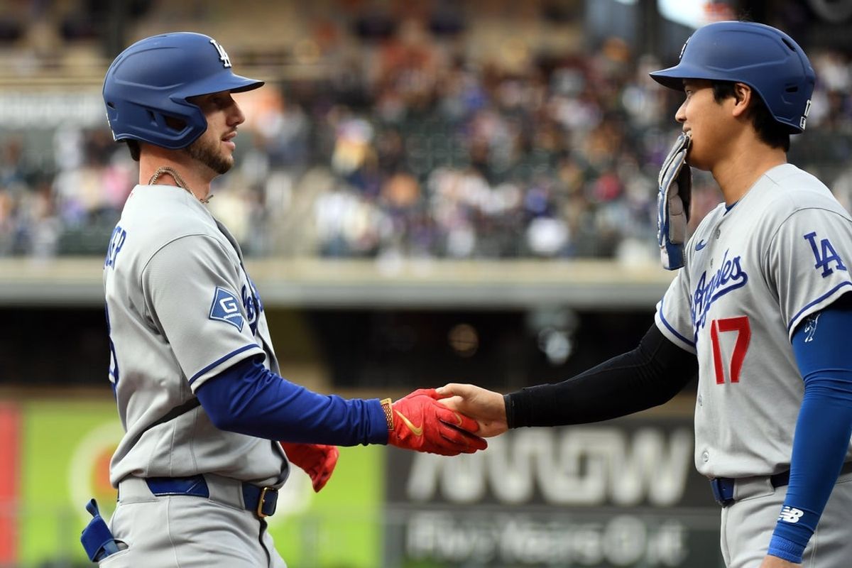 Apr 18, 2026; Denver, Colorado, USA; Los Angeles Dodgers outfielder Kyle Tucker (23) is congratulated by designated hitter Shohei Ohtani (17) after a two-run home run during the first inning against the Colorado Rockies at Coors Field. Mandatory Credit: Christopher Hanewinckel-Imagn Images