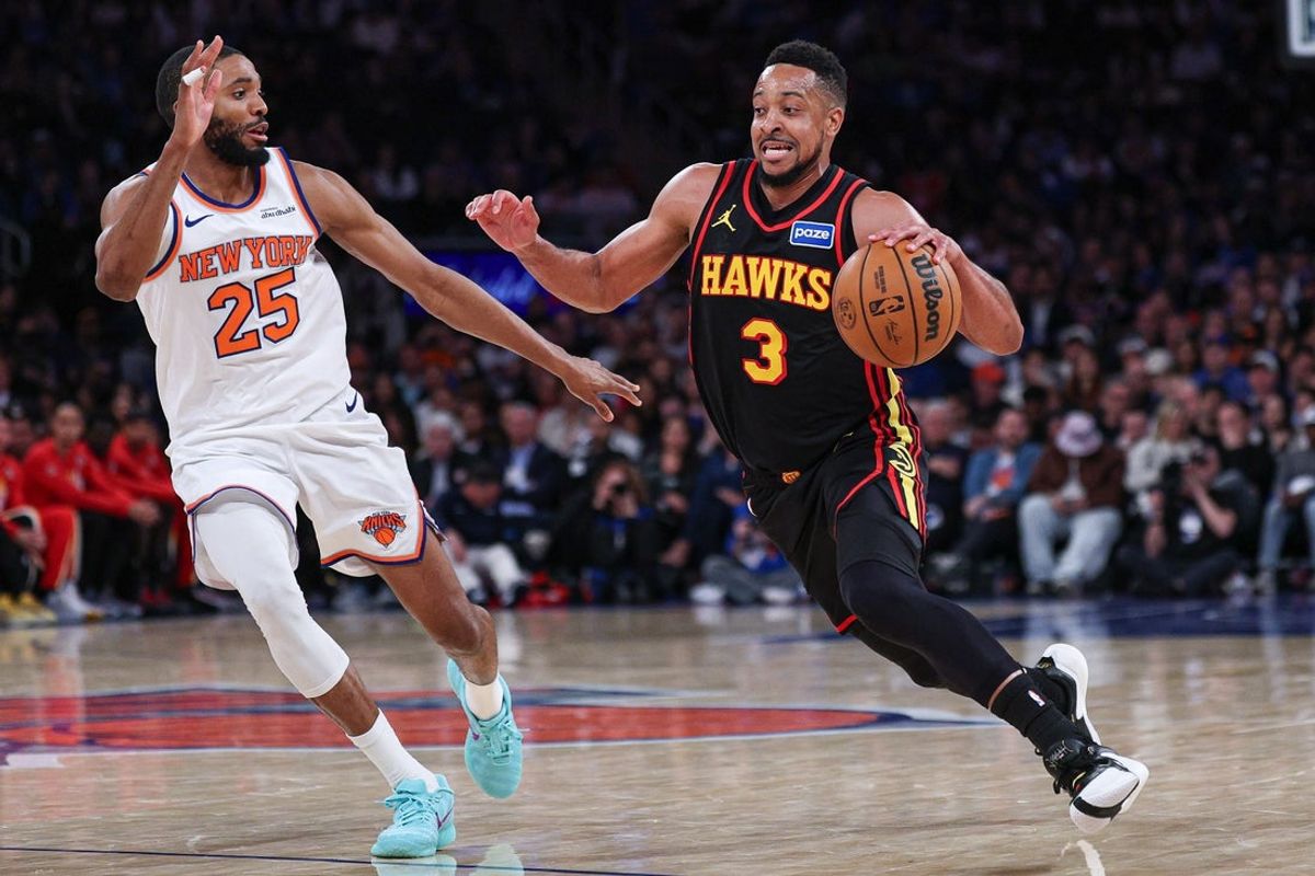 Apr 18, 2026; New York, New York, USA; Atlanta Hawks guard CJ McCollum (3) dribbles as New York Knicks guard Mikal Bridges (25) defends during the second half of the 2026 NBA Playoffs at Madison Square Garden. Mandatory Credit: Vincent Carchietta-Imagn Images