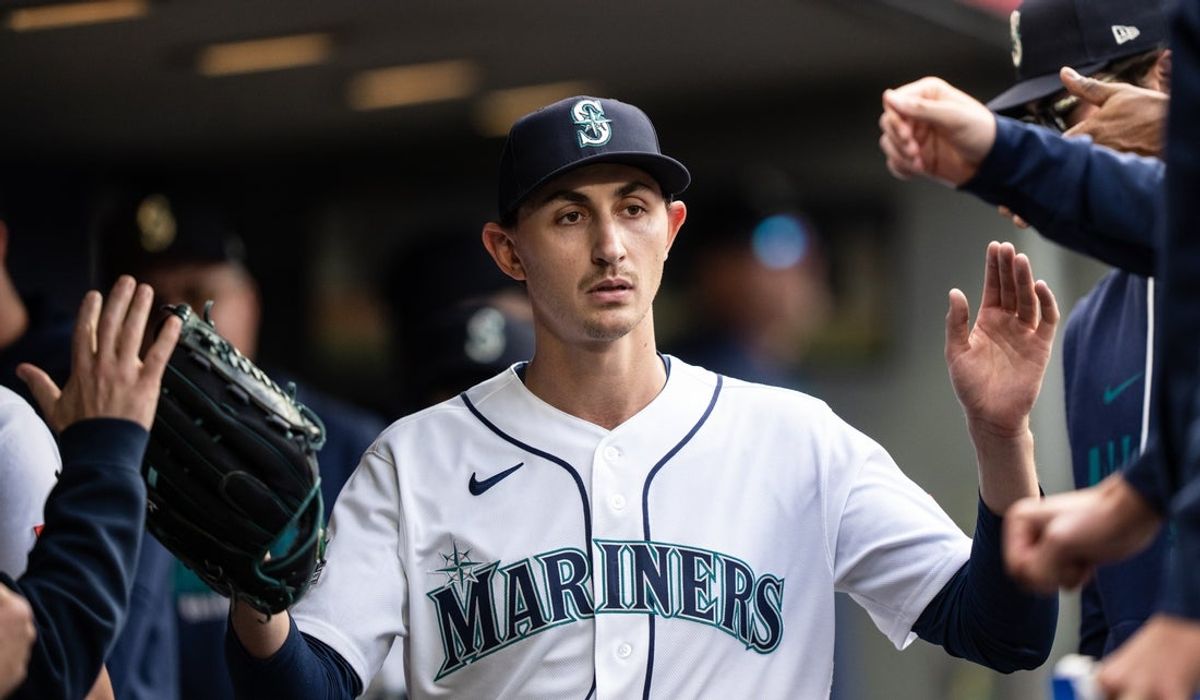 Apr 18, 2026; Seattle, Washington, USA; Seattle Mariners starting pitcher George Kirby (68) is greeted by teammates in the dugout after being pulled from a game in the sixth inning against the Seattle Mariners at T-Mobile Park. Mandatory Credit: Stephen Brashear-Imagn Images